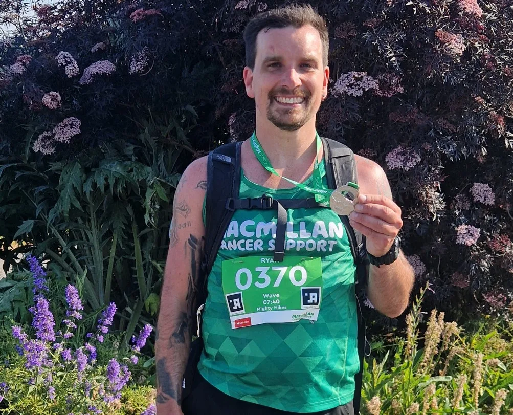 Animal care assistant with cystic fibrosis completes charity marathon