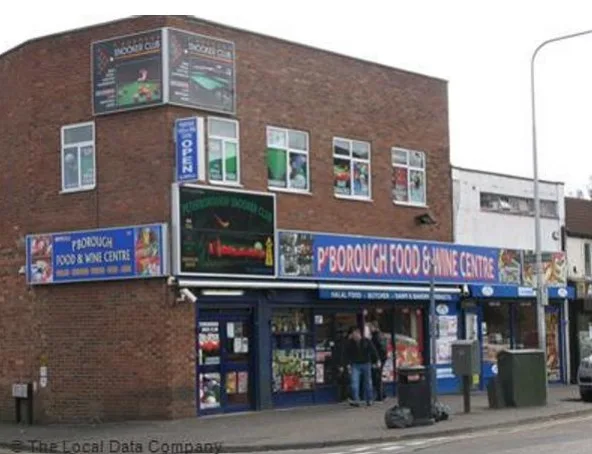 A Peterborough snooker club has had its licence to sell alcohol revoked after suspected drug dealing took place on the premises.