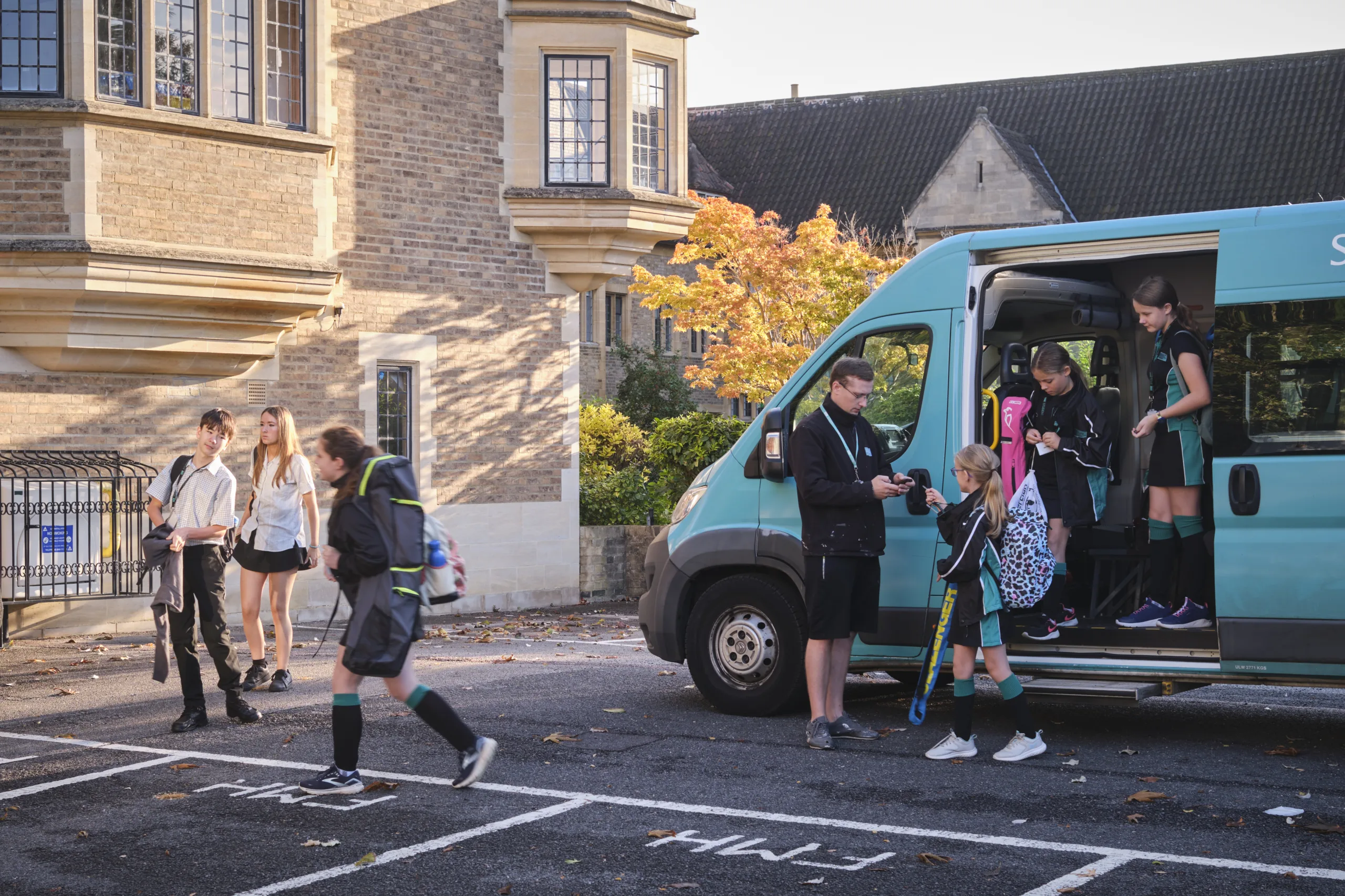 Photo Caption 1: Stephen Perse Foundation pupils using the school’s improved bus travel with Kura