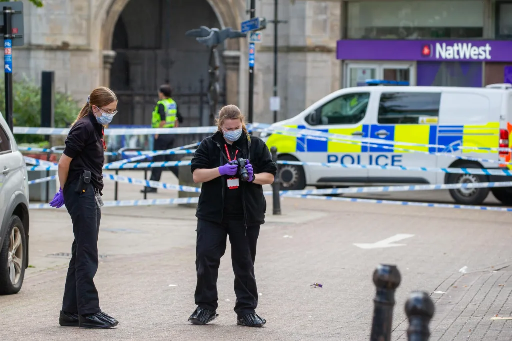 Grim scenes in Wisbech today as a cordon remained in place following a stabbing in or near The Globe public house last night. PHOTO: Terry Harris 