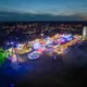 Aerial images of Peterborough’s Bridge Fair with the city skyline in the distance, Embankment, Peterborough Friday 29 September 2023. Picture by Terry Harris.