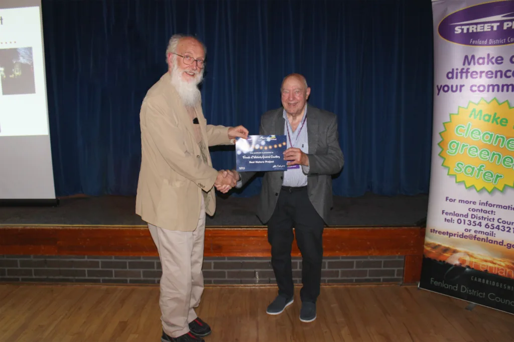 Robert Hine collects the award from Cllr Murphy