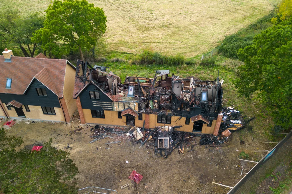 Police are working closely with fire service investigators after fire destroyed two new homes in St Ives in an arson attack. PHOTO: Terry Harris