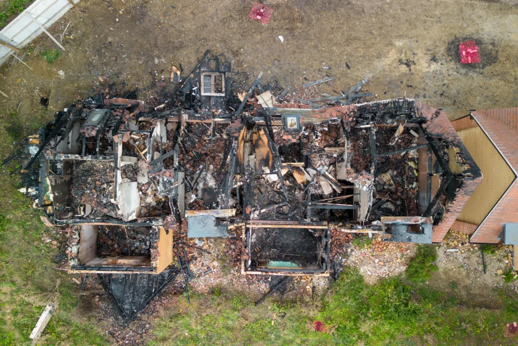 Police are working closely with fire service investigators after fire destroyed two new homes in St Ives in an arson attack. PHOTO: Terry Harris