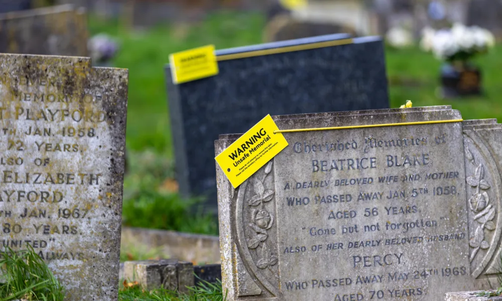 Residents in Terrington St Clement say health and safety has “gone mad” after their local council placed yellow warning tags on gravestones. PHOTO: Terry Harris