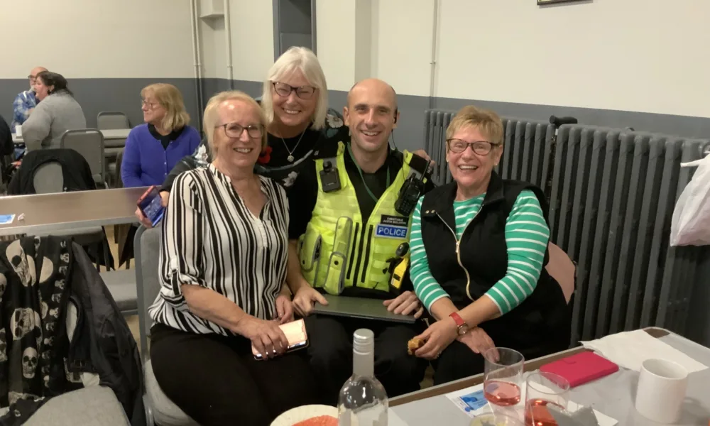 High Sheriff of Cambridgeshire, Dr Bharatkumar Khetani, cut the birthday cake as Walsoken Village Hall Community Coffee Morning celebrated its 2nd anniversary. Local police dropped in for a cuppa and cake. PHOTO: Wisbech Tweet