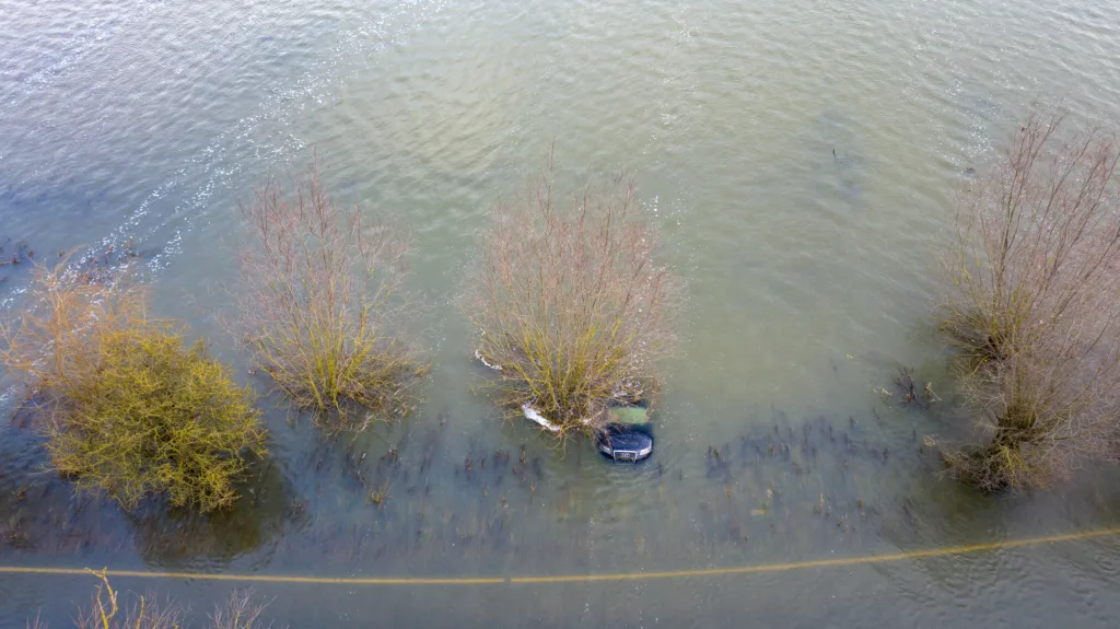 Picture dated December 20th shows an Audi car submerged on the flooded A1101 in Welney; one of two cars spotted floating in the waters. PHOTO: Bav Media 