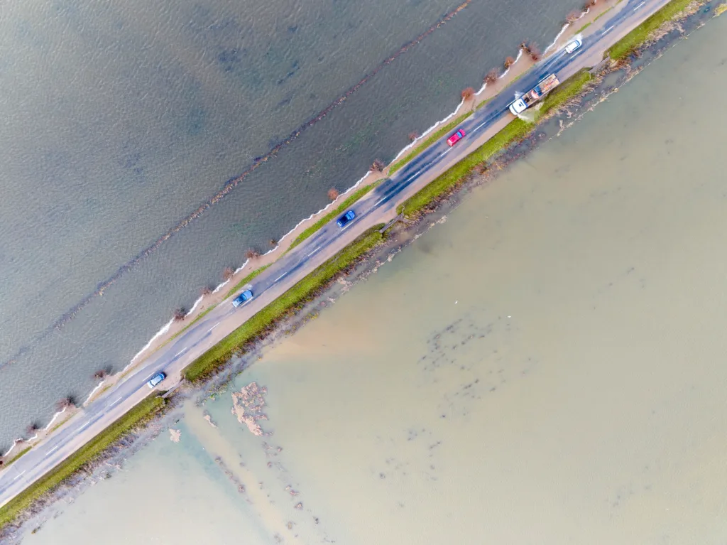 Road starts to flood as severe flood warning is issued for the B1040,B1040, Whittlesey Monday 11 December 2023. Picture by Terry Harris.