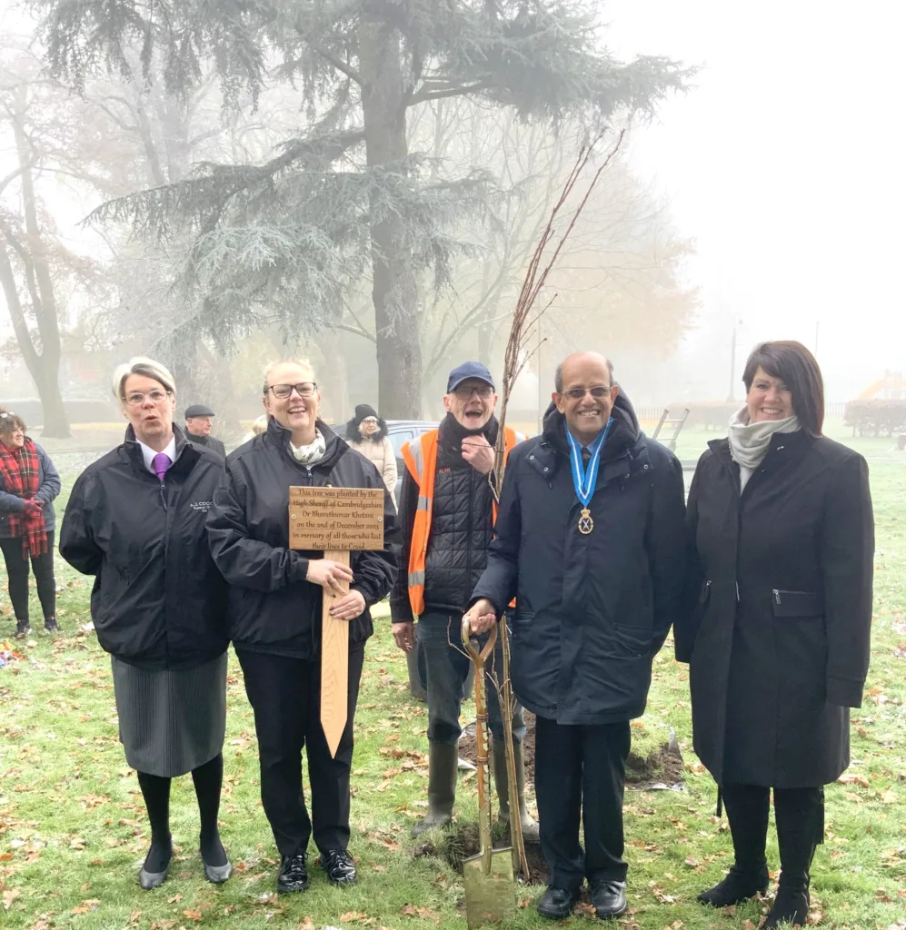 The High Sheriff of Cambridgeshire Dr Bharatkumar N Khetani plants a tree and unveils a plaque in memory of Covid victims was planted in Wisbech. PHOTO: Wisbech Tweet 