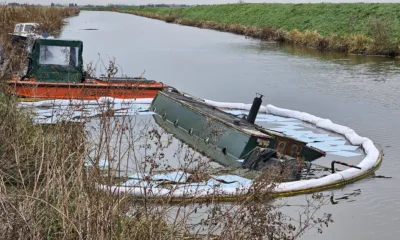 The boat that came adrift from its unofficial mooring on the river at March