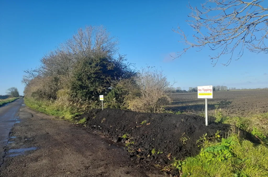 After: The site has been cleared and a soil and concrete bund put in place to deter fly-tippers.