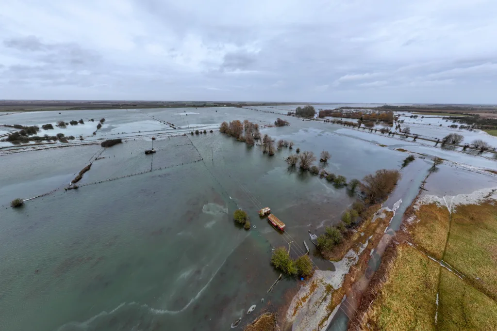 Flood water along the B1040 at Whittlesey as Storm Isha begins to batter Britain. The Environment Agency warned today that river levels at Whittlesey remain high “following a previous period of persistent rainfall in the catchment. PHOTO: Terry Harris
