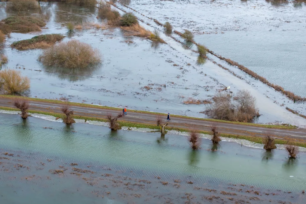 Flood water along the B1040 at Whittlesey as Storm Isha begins to batter Britain. The Environment Agency warned today that river levels at Whittlesey remain high “following a previous period of persistent rainfall in the catchment. PHOTO: Terry Harris
