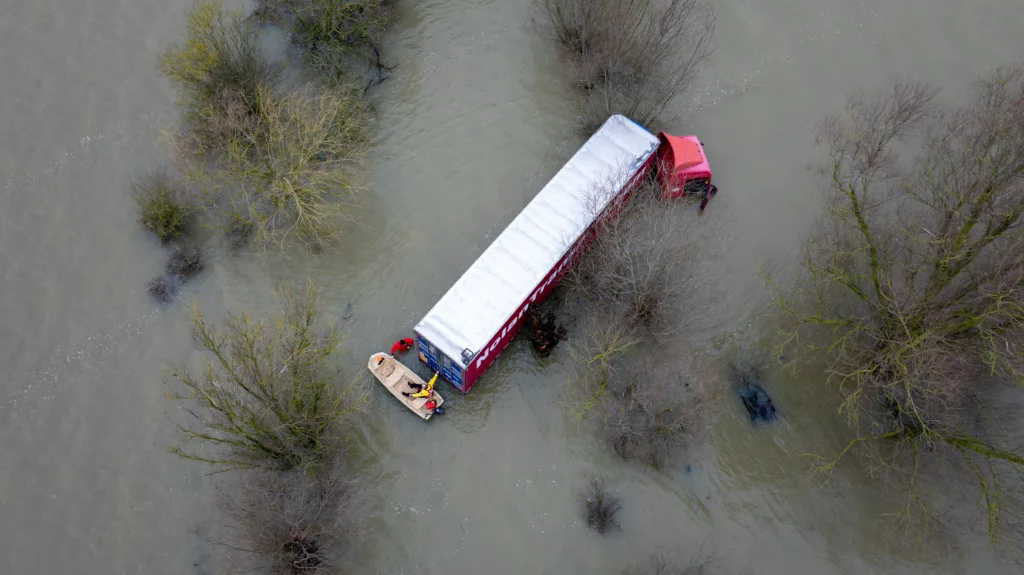 Recovery team from Manchetts were praised for their efforts in retrieving this cab and trailer that the driver was forced to abandon in the early hours of Monday on the flooded A1101 Welney Wash Road. PHOTO: Bav Media 