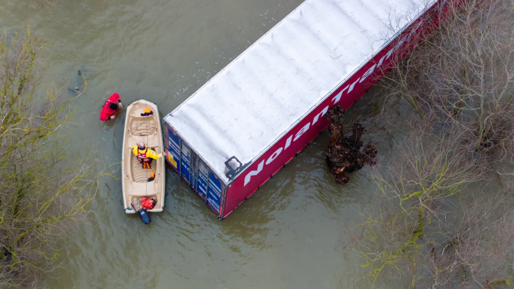 Recovery team from Manchetts were praised for their efforts in retrieving this cab and trailer that the driver was forced to abandon in the early hours of Monday on the flooded A1101 Welney Wash Road. PHOTO: Bav Media 