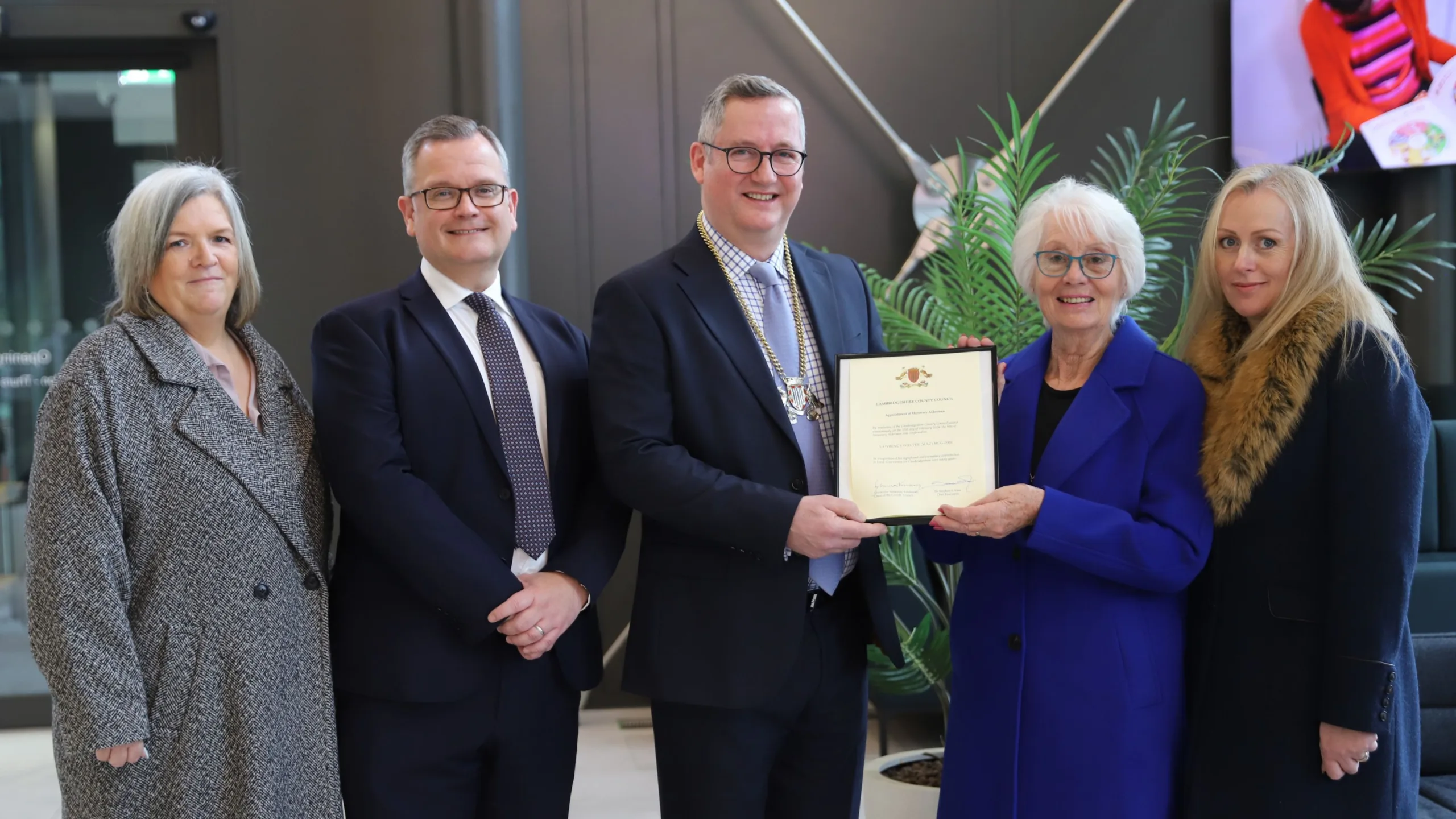 Cllr Mac McGuire's wife and daughters receiving the Honorary Alderman award (left to right): Catherine McGuire, Stephen Moir, Cllr Sebastian Kindersley, Viv McGuire, Michelle Sowman).