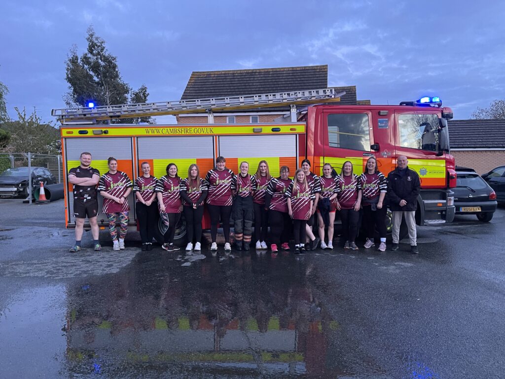 The women’s team of March Bears Rugby Club learn some basic fire fighter techniques during a visit to March Fire Station. PHOTO: Cambs Fire and Rescue