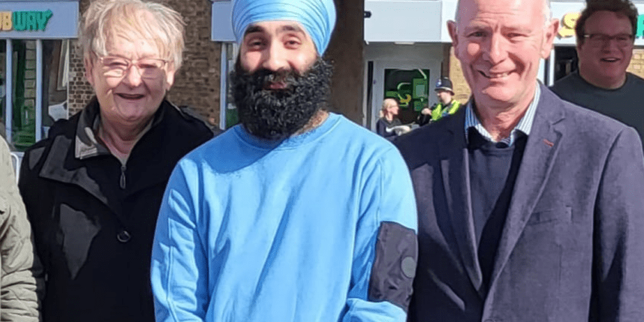 Gurninder Singh Gill (centre) flanked by Whittlesey mayor Cllr Kay Mayor and the Conservative police and crime commissioner candidate Darryl Preston