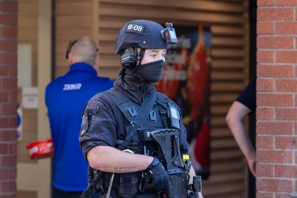 Armed police out in Peterborough today and gave chase prior to arrest in Broadway. PHOTO: Terry Harris 