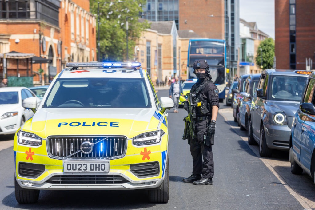 Armed police out in Peterborough today and gave chase prior to arrest in Broadway. PHOTO: Terry Harris 