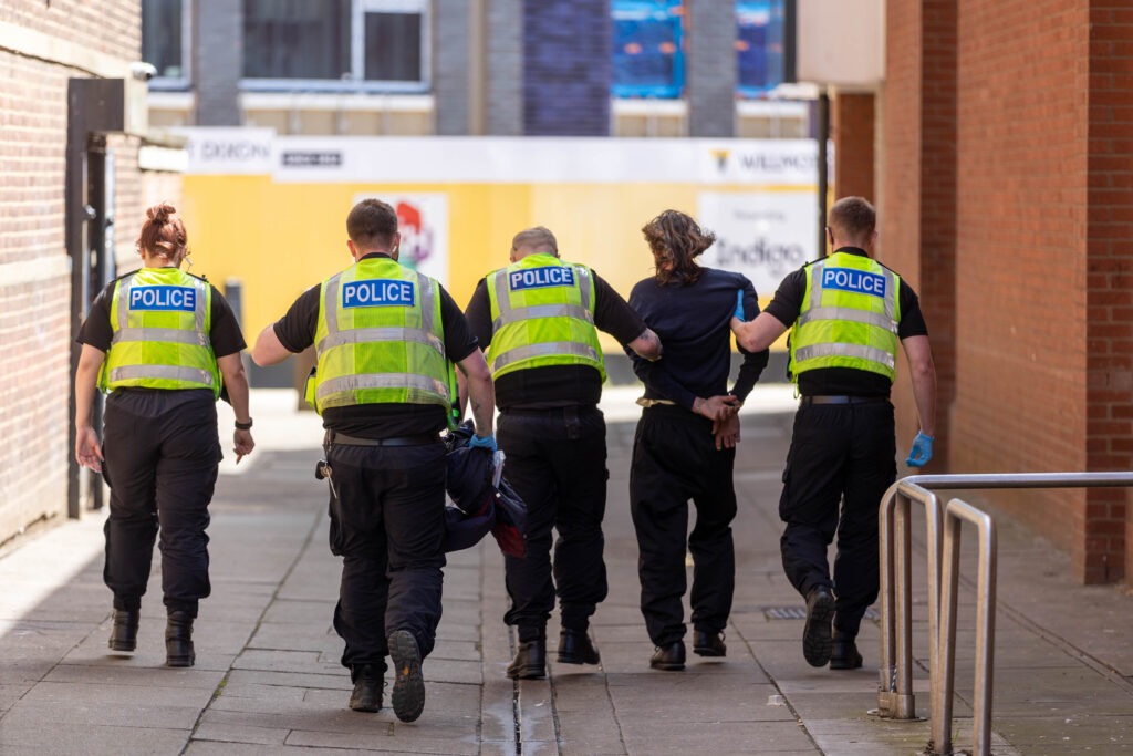 Armed police out in Peterborough today and gave chase prior to arrest in Broadway. PHOTO: Terry Harris 