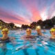 Swimmers take to the pool at 4am for a sunrise swim on the Summer Solstice. City lido, Peterborough Thursday 20 June 2024. Picture by Terry Harris.