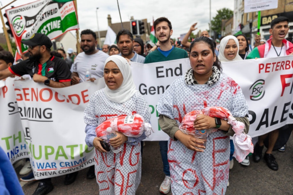 March for Free Palestine Peterborough. The march left Lincoln Road Park and ended at Cathedral Square where speakers addressed the public. Lincoln Road / Cathedral Square, Peterborough Sunday 23 June 2024. Picture by Terry Harris.