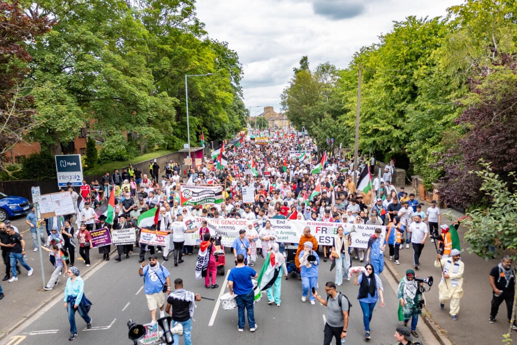 March for Free Palestine Peterborough. The march left Lincoln Road Park and ended at Cathedral Square where speakers addressed the public. Lincoln Road / Cathedral Square, Peterborough Sunday 23 June 2024. Picture by Terry Harris.