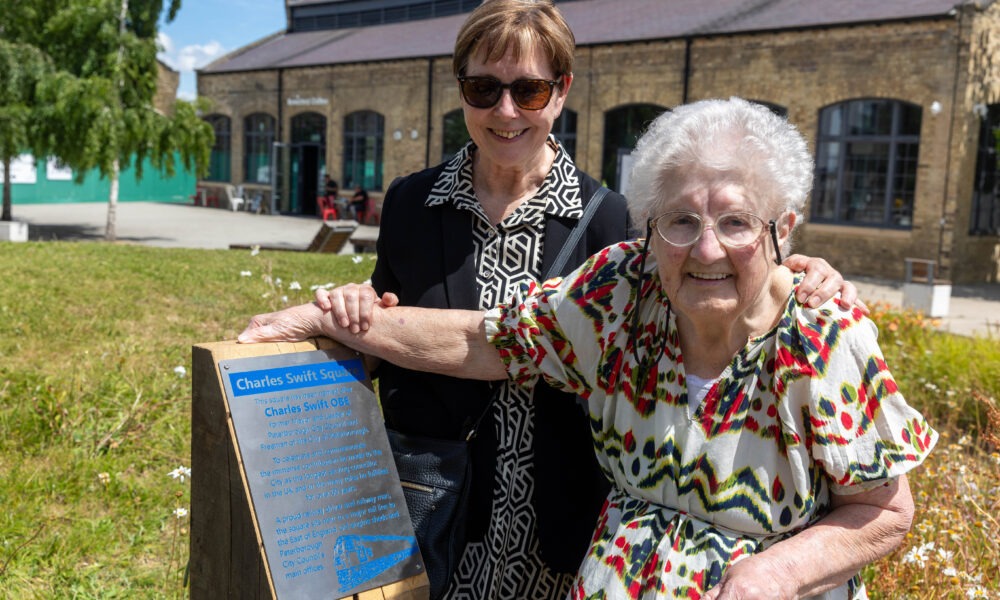 A plaque to commemorate Charles Swift after a square was named in his honour was unveiled today by his widow Brenda.  Brenda was joined by close family and friends and many councillors Including the Mayor Marco Cereste who hosted the event. Charles Swift Square, Peterborough Thursday 27 June 2024. Picture by Terry Harris.