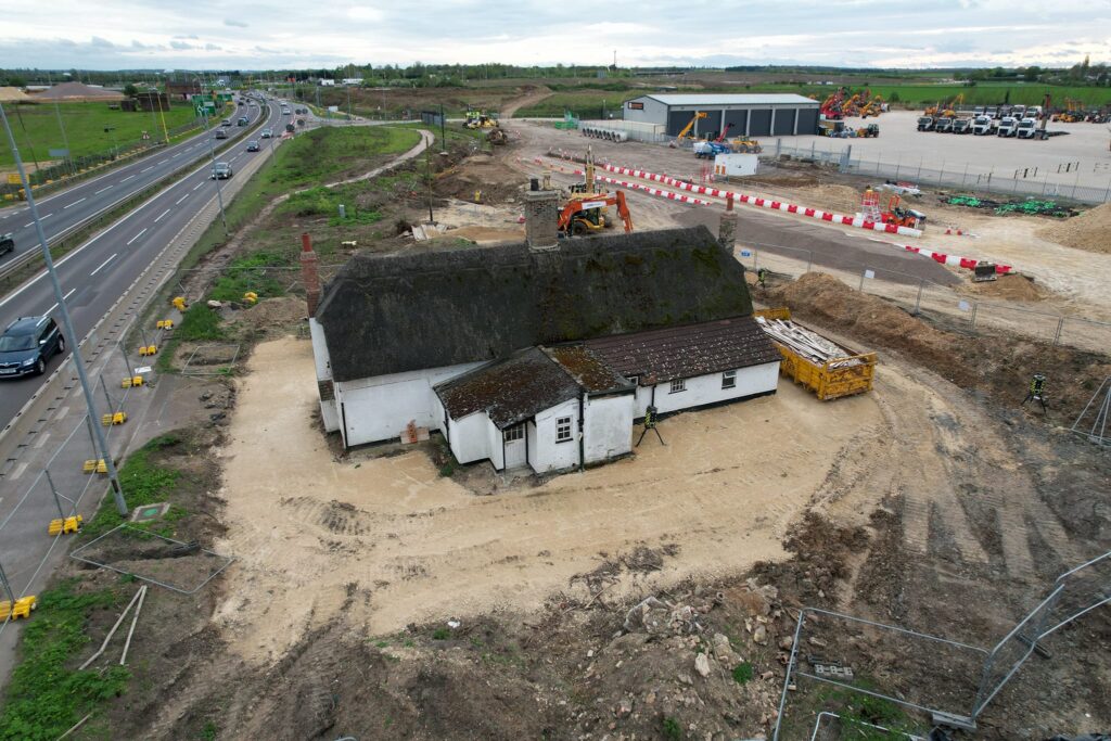 Historic Brook Cottages near the Black Cat roundabout just prior to demolition: PHOTO Drone Photos Sandy 