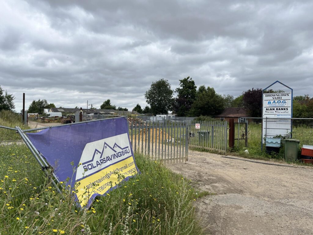 Housing planned for Brownlows Yard in Creek Road, March: within the brownfield land, there are commercial buildings and land being used for the storage of commercial and building materials, vehicles, and a caravan. PHOTO: John Elworthy